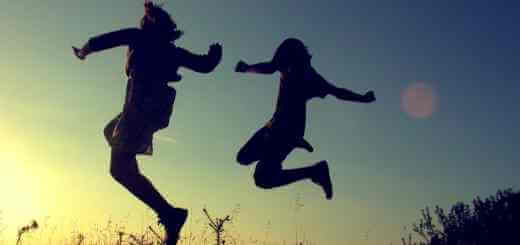 Girls jumping for joy and happiness