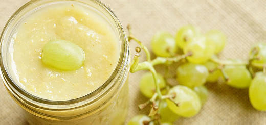 A glass of Green Grape sauce and fresh grapes